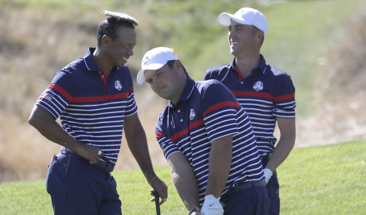 Woods, Reed y Thomas durante  las prácticas. /Foto AP