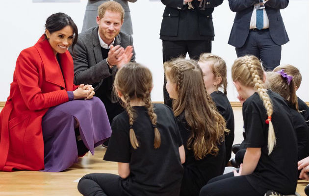 Harry y a su esposa, Meghan Markle. 