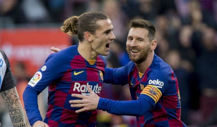 Antoine Griezmann celebra con Leo Messi Foto AP