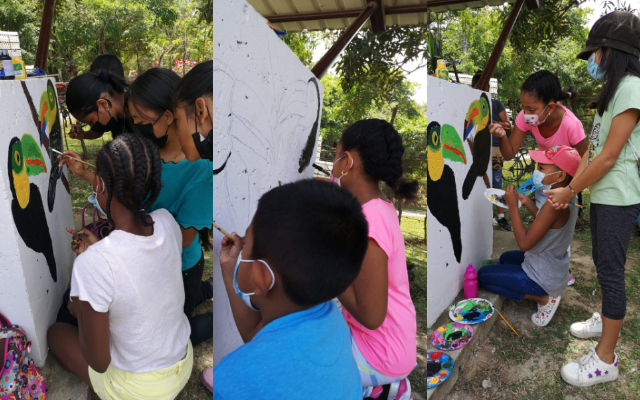 Niños pintando una parada en la comunidad de La Reforma. Fotos: Cortesía